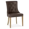 Bentley Designs Westbury Rustic Oak 4-6 Seater Dining Set & 4 Scoop Uph Chairs- Espresso Faux Leather- chair front angle